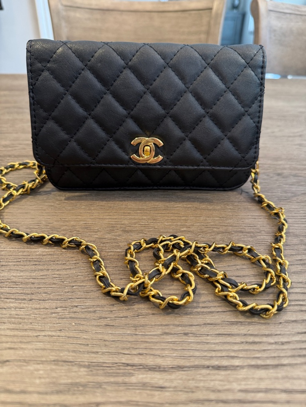 Chanel Quilted Leather Crossbody Bag in Black with Gold Chain